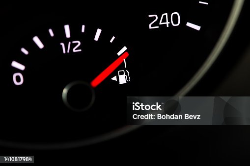 istock Close up of a fuel gauge showing a full fuel tank in a car, transportation with fossil fuel, efficiency of modern vehicles 1410817984