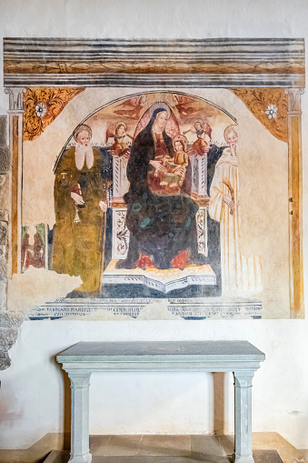 Fresco inside the small Church of Santi Tiburzio e Susanna in Castello di Gargonza, dating back to the 13th century