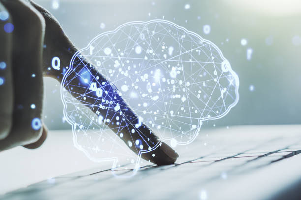 istock Creative artificial Intelligence concept with human brain hologram and hands typing on laptop on background. Multiexposure 1410820009