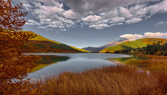Autumn landscape of Doxa (or Feneos) lake, an artificial lake in western Corinthia, Peloponnese Greece. It is fed and drained by the small river Doxa, which empties into the plain of Feneos.