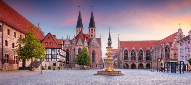 Brunswick, Germany. Panoramic cityscape image of historical downtown of Brunswick, Germany with St. Martini Church and Old Town Hall at summer sunset. braunschweig stock pictures, royalty-free photos & images