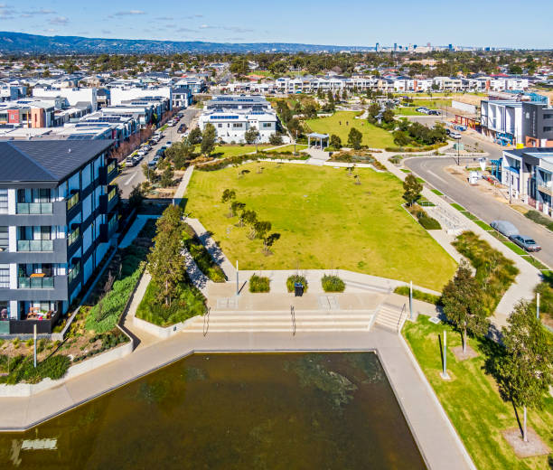 istock Aerial view, high angle looking down on green space in modern housing development 1410825804