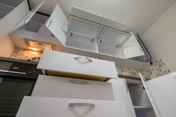istock Renovated Interior for modern trendy white kitchen with doors open 1410827288
