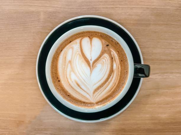 istock A cup of coffee on a wooden table 1410828579