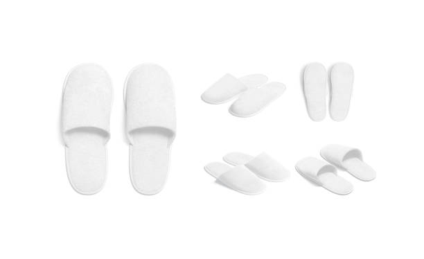 Blank white home slippers mockup, different views Blank white home slippers mockup, different views, 3d rendering. Empty house or hotel comfortable slipshoe mock up, isolated. Clear flip-flops or clog foot wear for bath template. slipper stock pictures, royalty-free photos & images