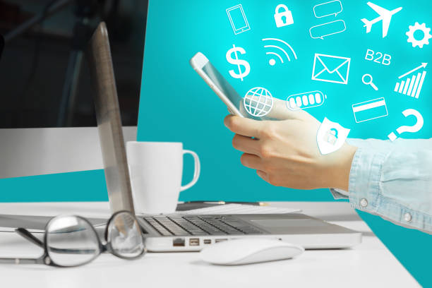istock Young woman sitting at the table with open netbook computer. Female person using modern technology. 1410831566