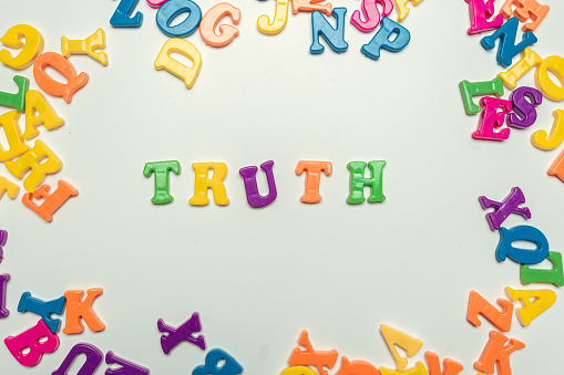 truth word concept in plastic colorful letters