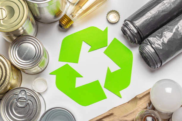 istock Eco concept with recycling symbol on table background top view 1410832537