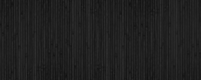 Black bamboo slat wide texture. Abstract wooden backdrop. Textured wood plank dark background