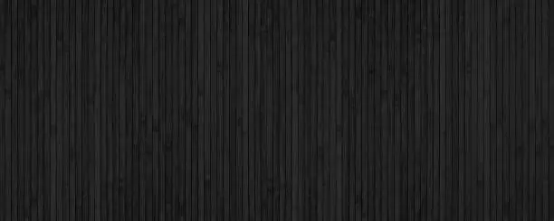 Photo of Black bamboo slat wide texture. Abstract wooden backdrop. Textured wood plank dark background