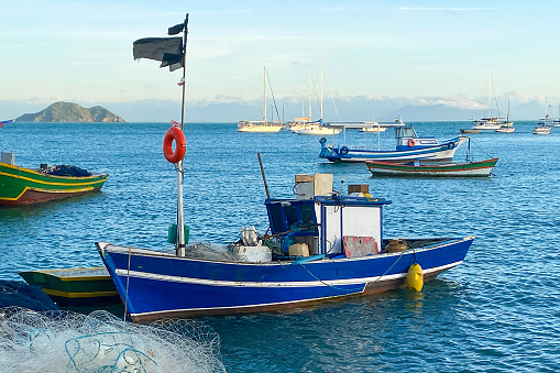 A small fishing boat on the waterfront in Armacao dos Buzios, Rio de Janeiro, Brazil