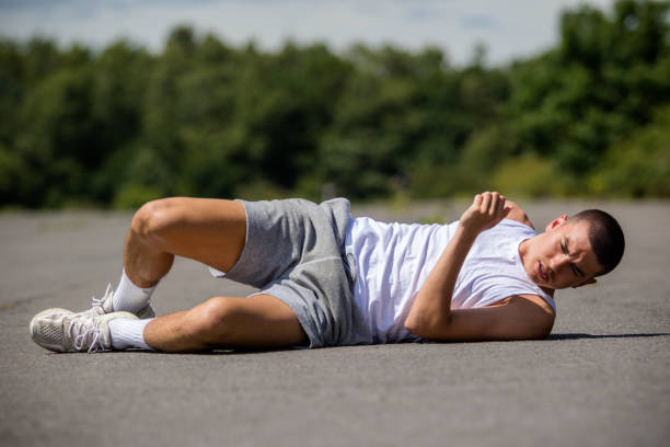 istock A Nineteen Year Old Teenage Boy Doing Situps In A Public Park 1410835438