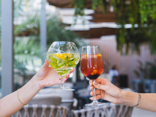 istock a couple drinking cocktails at a celebration 1410835996