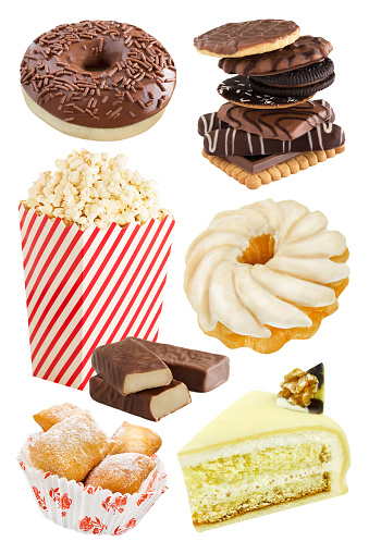 Trans fats in cake, cookies, popcorn and chocolate isolated on white background
