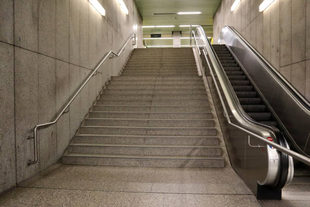 istock Empty stairway and escalator at a subway station 1410837388