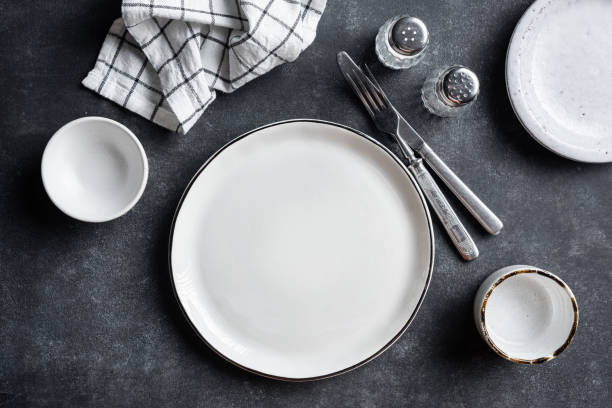 istock Table setting arrangement with cutlery and table napkin 1410837490