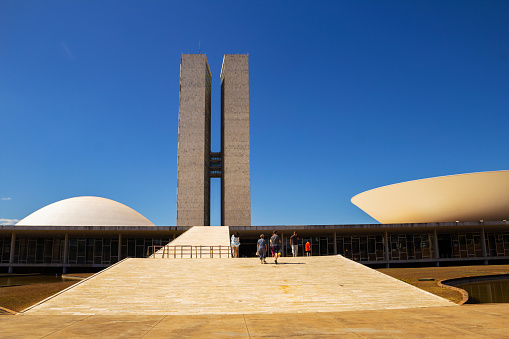 Brasília, Federal District, Brazil – July 23, 2022: Cityscape - detail of the National Congress in Brasilia with blue sky in the background. Federal Capital of Brazil. It is an architectural work by Oscar Niemeyer.