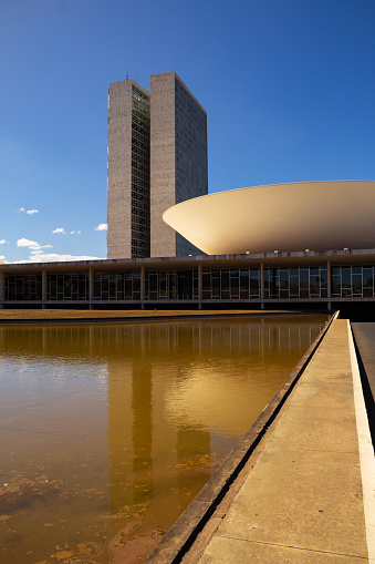 Brasília, Federal District, Brazil – July 23, 2022: Cityscape - detail of the National Congress in Brasilia with blue sky in the background. Federal Capital of Brazil. It is an architectural work by Oscar Niemeyer.