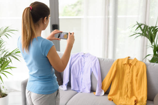istock Woman selling her used clothes online 1410839385