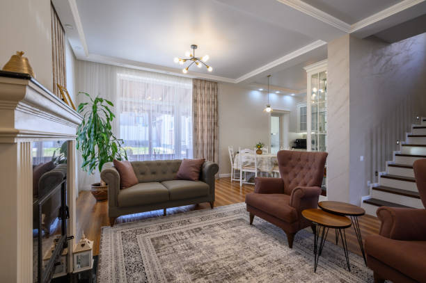 istock Studio apartment living room with white large kitchen and dining table 1410842856