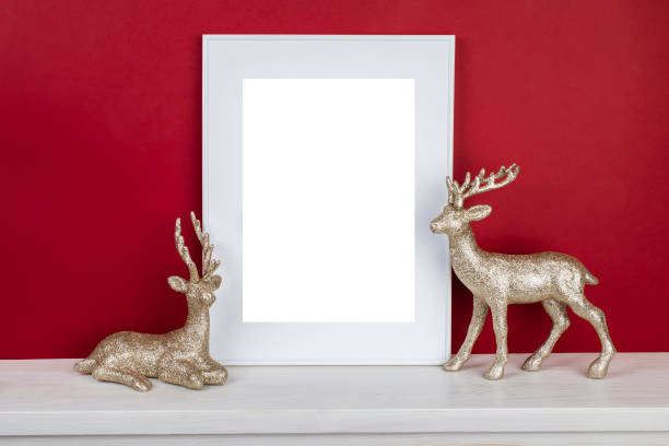 istock Mock up poster. Minimal template with empty picture frame mock up. Minimalist Christmas interior decoration, reindeer 1410842877