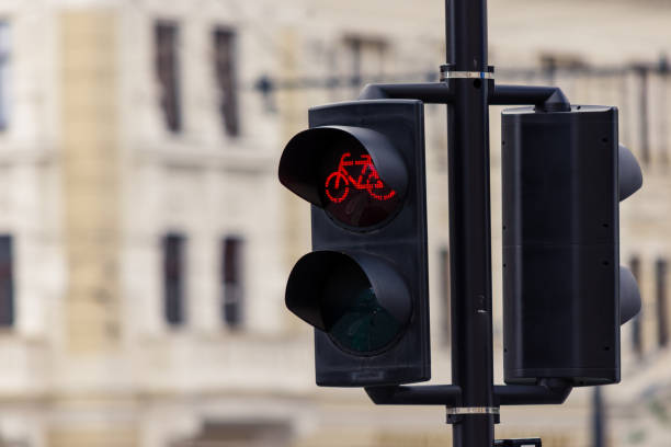 istock Bicycle stop sign on electric semaphore in an urban area 1410846932