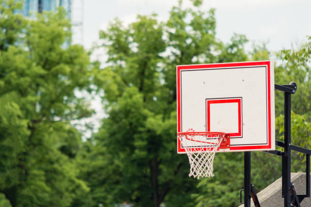 istock Red and white basketball hoop 1410847160