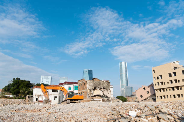 Construction machinery is demolishing the house