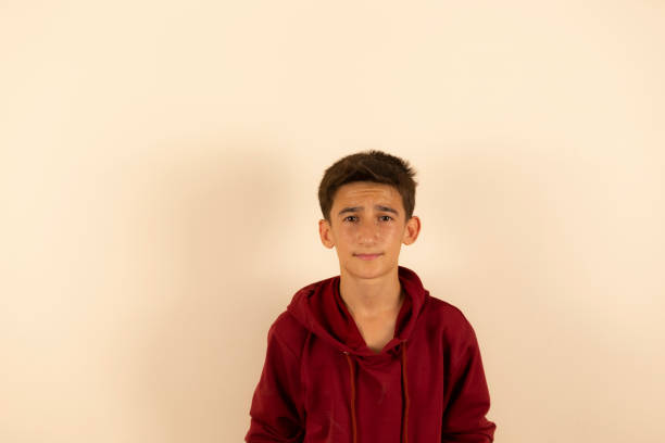 istock Portrait of boy looking at camera with text field. 1410848278