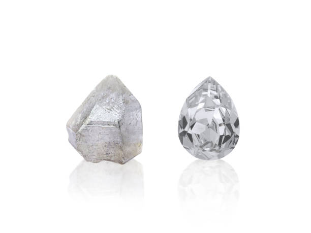 istock Dazzling diamond before and after uncut on white background 1410850461