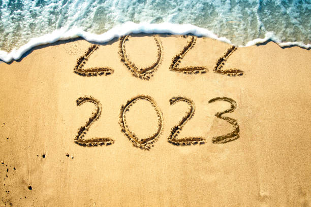 istock New Year 2023 on the beach. 1410851038