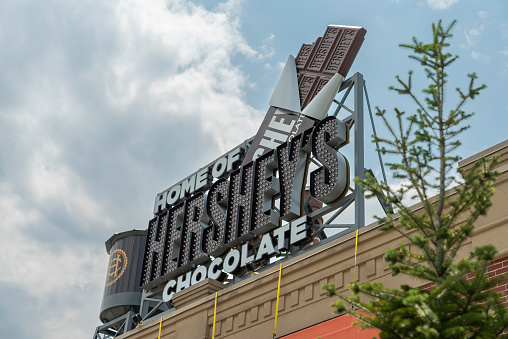 Hershey, Pennsylvania, USA – June 30, 2022:  Hershey Park Chocolatetown entrance of the amusement park in Hershey, Pennsylvania.