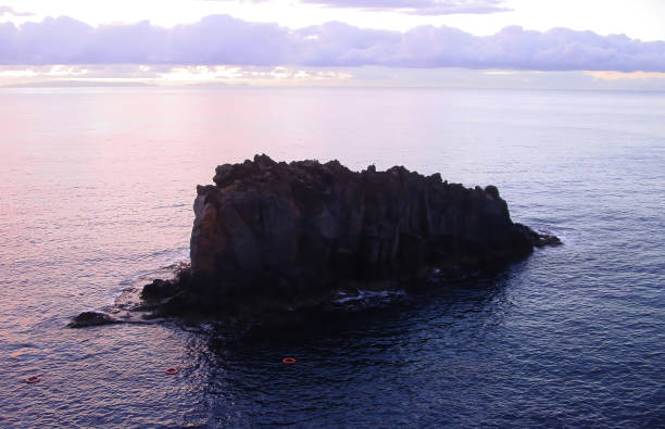 istock A rock in pink colors of the sunrise 1410856486
