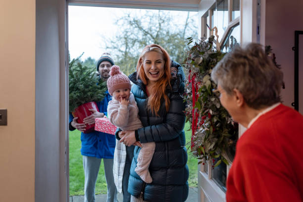 oh it's lovely to see you! - senior adult winter senior women daughter imagens e fotografias de stock