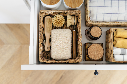 Zero waste products inside organization boxes on kitchen