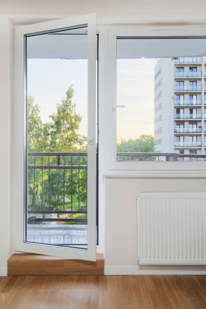 istock Living room with double glazed window and balcony door 1410862263