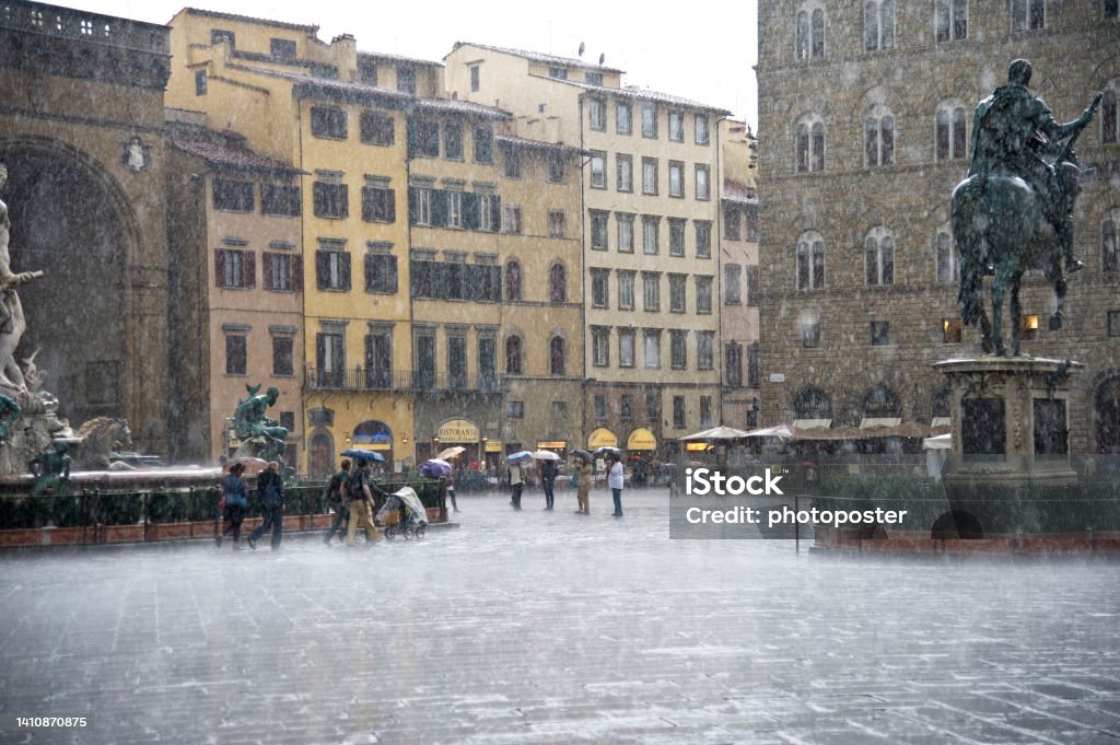 In the rain in Florence Downtown Florence in Italy in the rain on 11.10.2013 Beer Stein Stock Photo