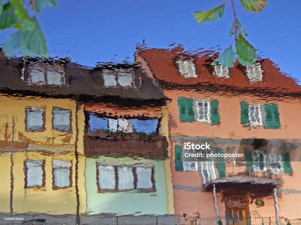 Reflection of the house facades Reflection of the house facades in Wertheim in Hesse in Germany on 3.1.2005 Color Image Stock Photo