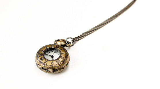 Vintage small watch pendant necklace for women. Isolated on white background
