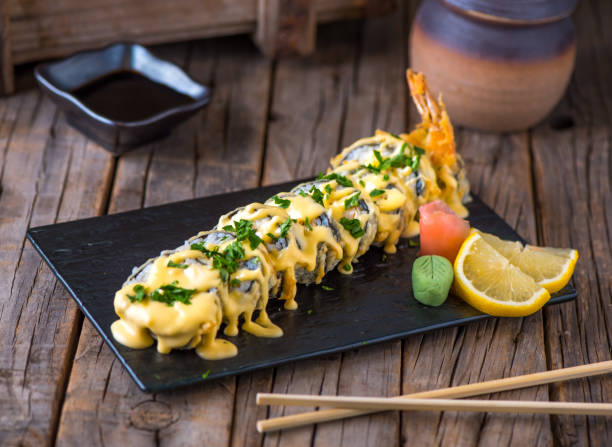 istock cheesy maki served in a dish isolated on wooden background side view 1410872432