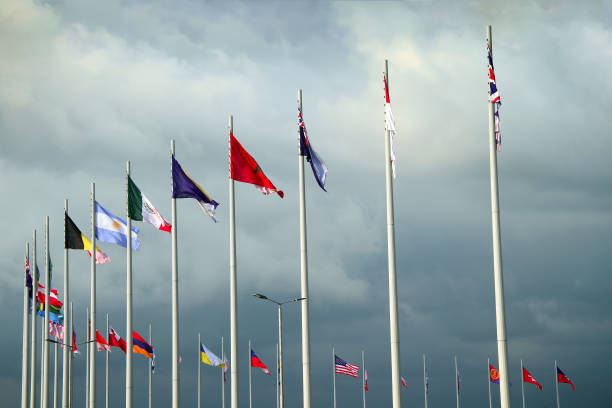 istock Flags of different countries on high flagpoles 1410873600