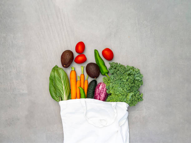 istock Reusable bag with fresh vegetables for a vegan diet. 1410874756
