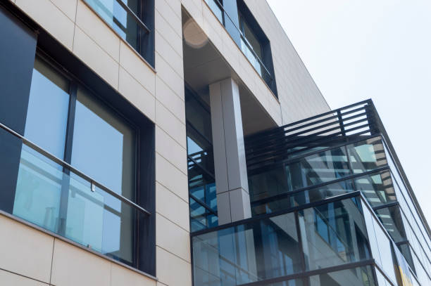 istock facade of a modern office building with large glass windows 1410875396