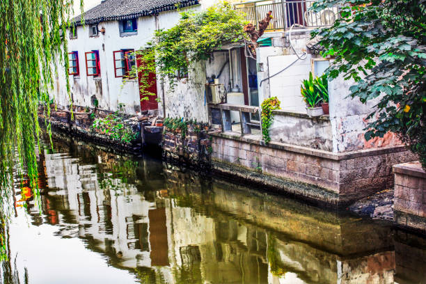 istock Ancient Chinese Houses Water Reflection Canals Suzhou China 1410876880