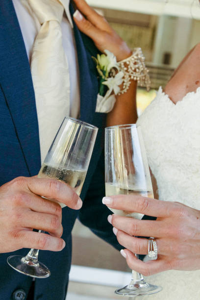 istock Bride and groom celebratory toast 1410879763
