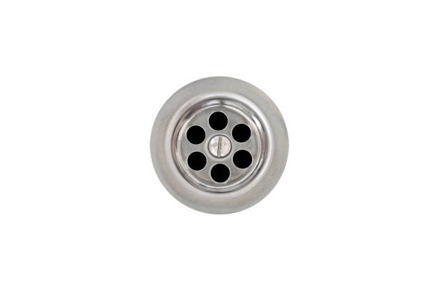 Metal sink drain isolated on white. Kitchen sink hole