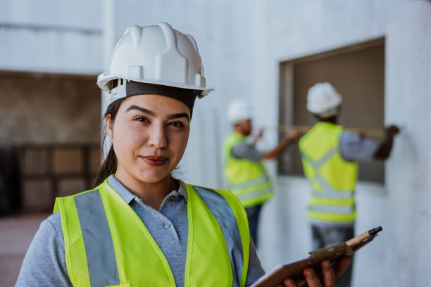 Woman at the construction site Woman at the construction site seria stock pictures, royalty-free photos & images