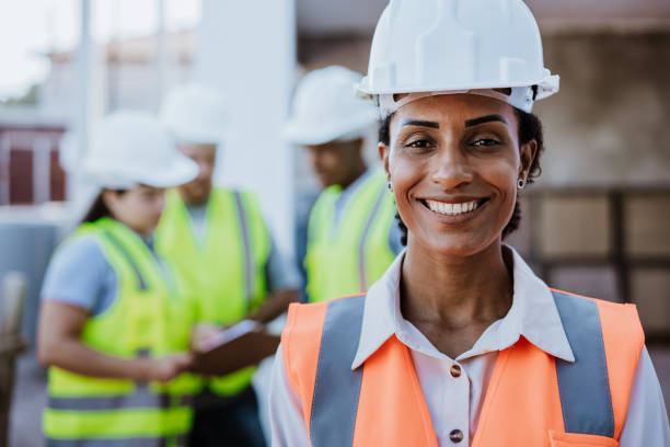 house building portrait of a woman at the construction site african american architecture stock pictures, royalty-free photos & images
