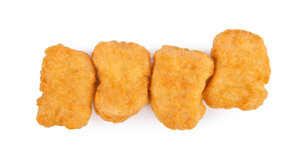istock Fried chicken nuggets isolated on white 1410884348