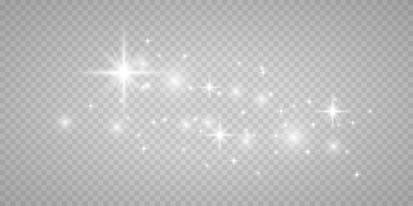 White design dust light. Bokeh light lights effect background. Christmas background of shining dust Christmas glowing light bokeh confetti and spark overlay texture for your design.